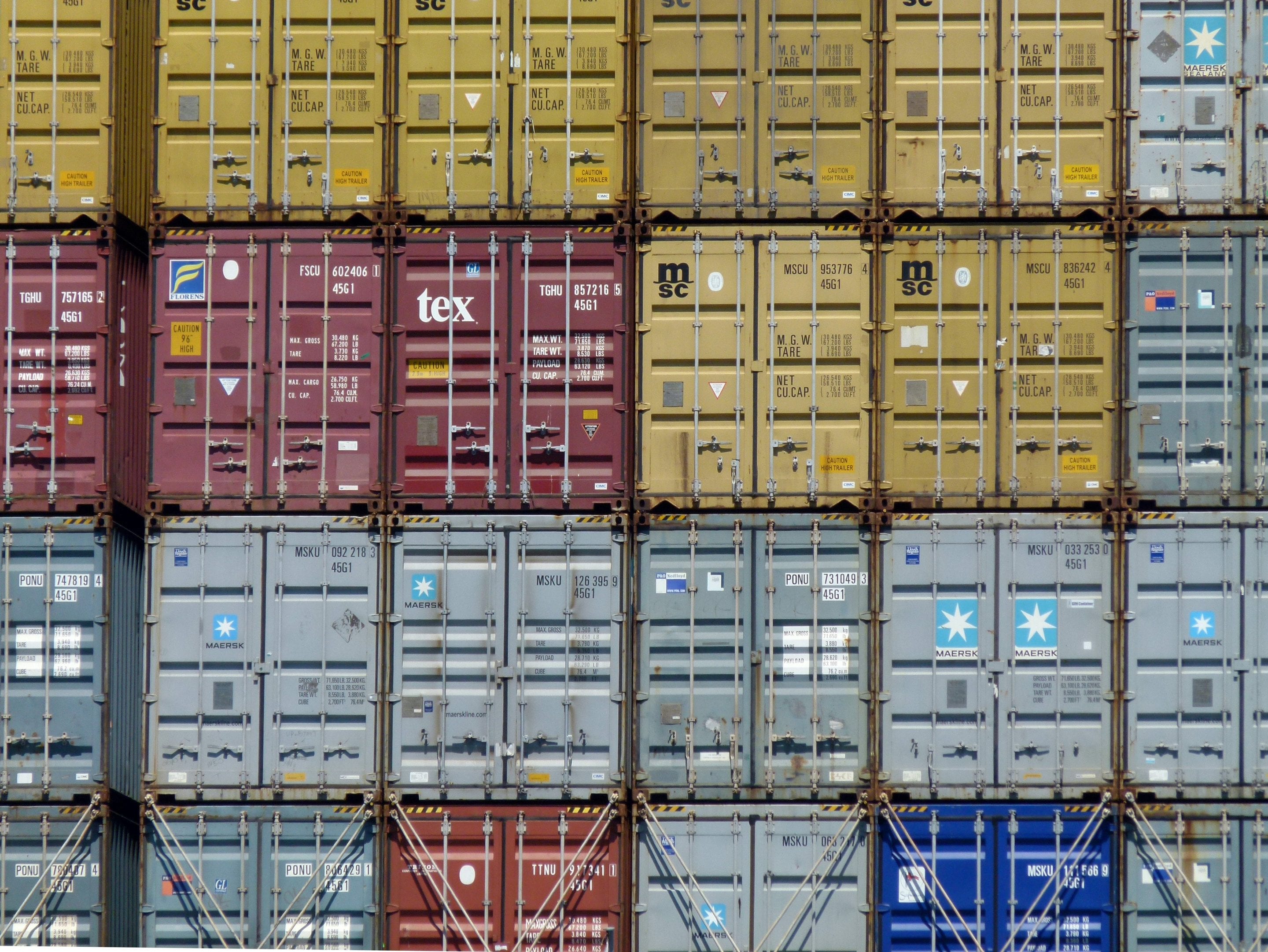 shipping containers stacked at the Port of Long Beach