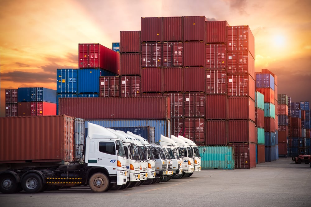 Line of drayage trucks waiting for cargo