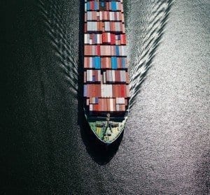 container ship in the ocean delivering goods safely and reliably
